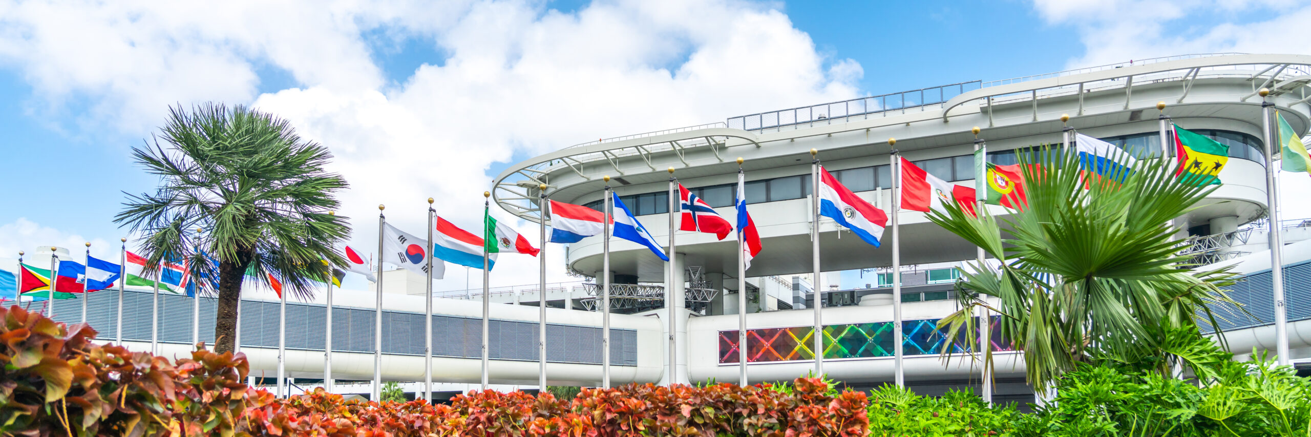 Miami international airport with flags of many different countries